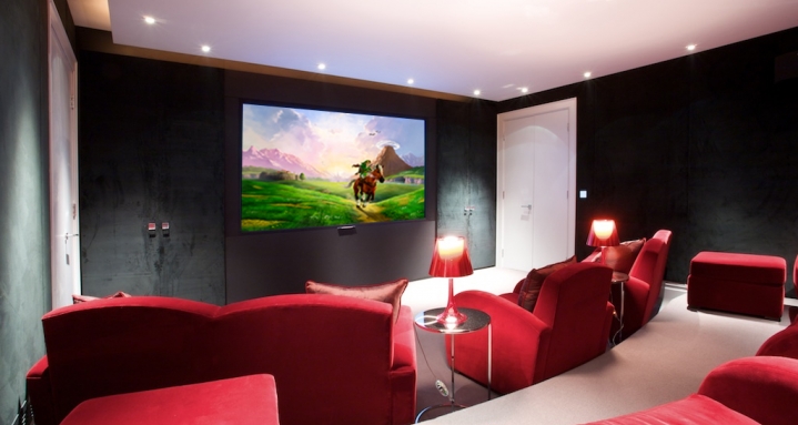 Basement cinema with hidden loudspeakers Hampstead Heath Cinema with Sony Projector