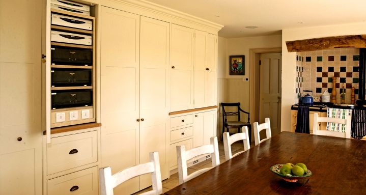 Multi-room audio equipment hidden in kitchen cupboard Multi-room audio equipment hidden in kitchen cupboard